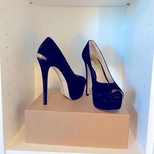 Micheal Kors Black Suede platform heels, size 7.